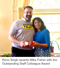 Renu Singh and Mike Fisher at an award ceremony